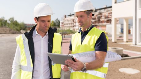 Two men on construction site