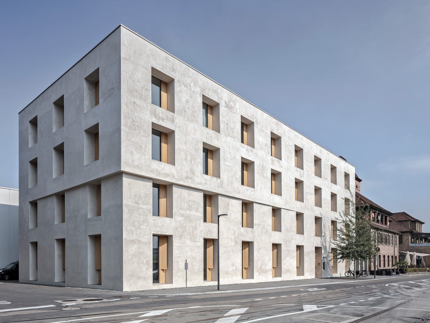 2232 Emmenweid. Brick Award 22 Category "Working together". Baumschlager Eberle Architekten. Photo of building
