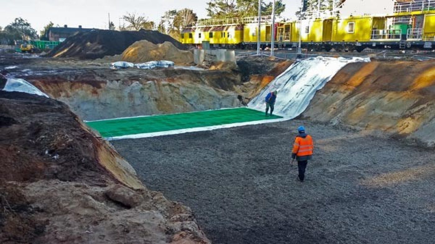 stormwater infiltration project, two people, green Stormboxes