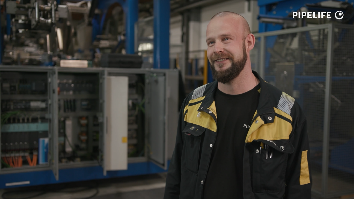 Man with beard and bald head in production