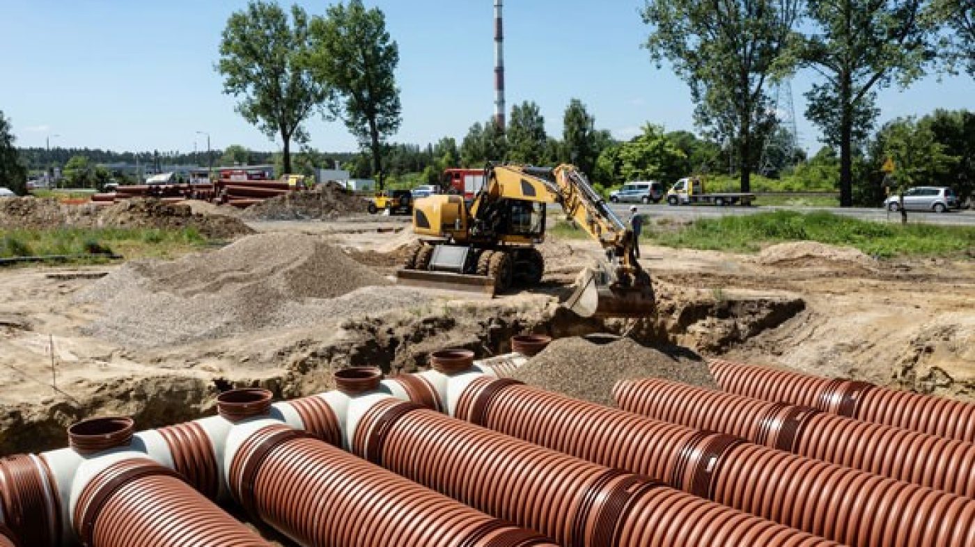 Construction site with pipes for water management
