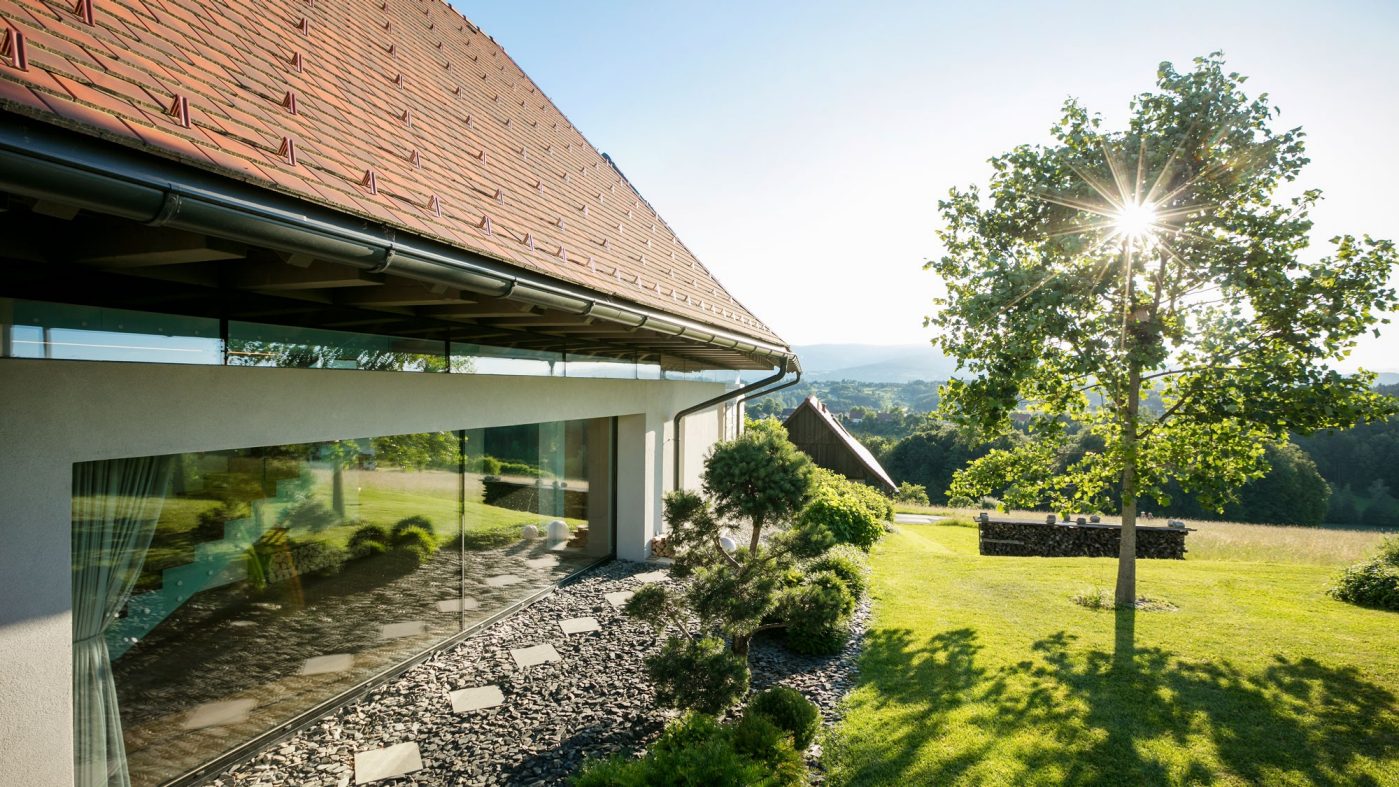 Single family house with tiled roof and window front