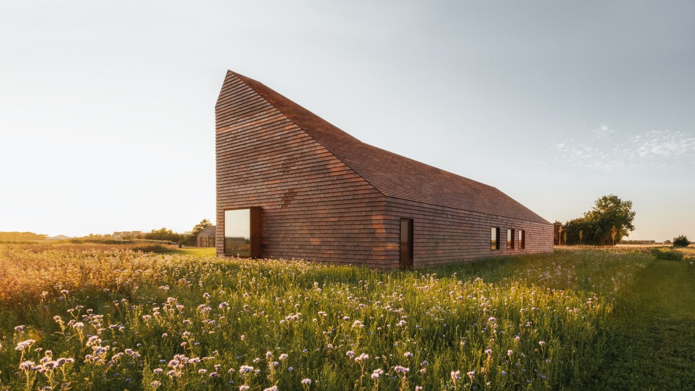 modern brick house on a meadow