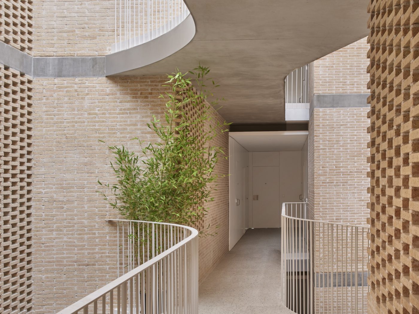 Brick Award 26 Nominee SOCIAL ATRIUM - 54 DWELLINGS IN THE BESÒS - Peris+Toral
