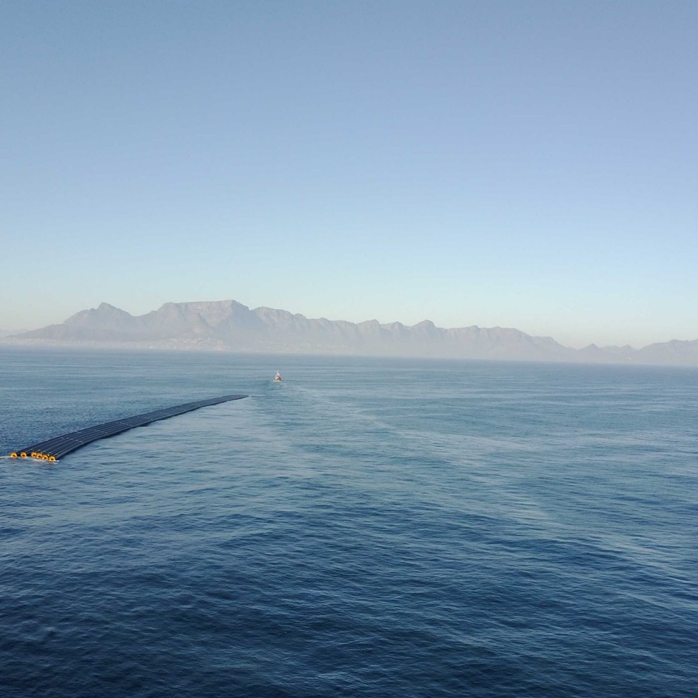 Ship pulling pipes on the sea