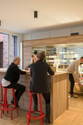 Employees chat in the cafeteria