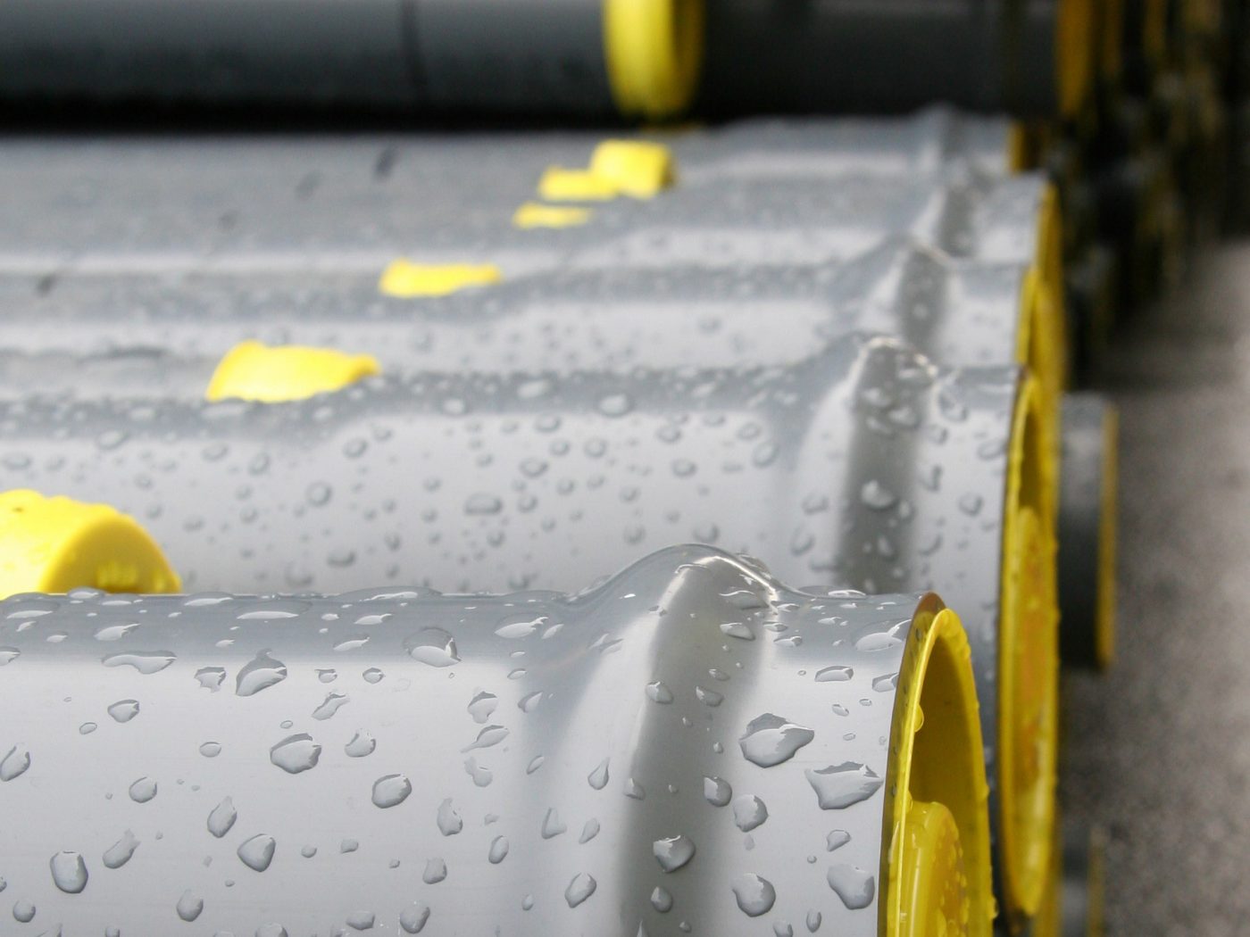 A close up of PVC potable water supply pipes