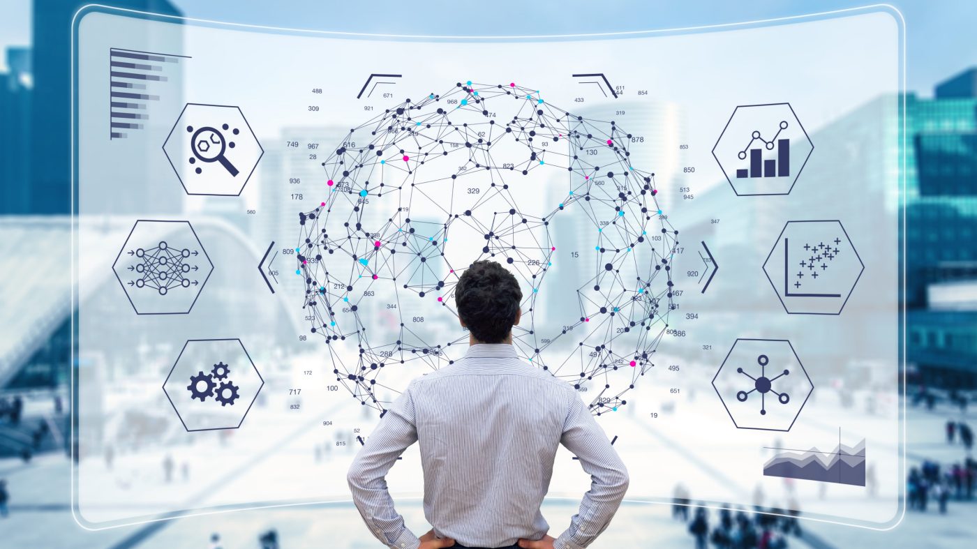 Big data analytics visualization technology with scientist analyzing information structure on screen with machine learning to extract strategical prediction for business, finance, internet of things