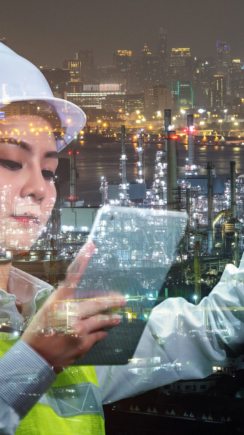 Industry 4.0 concept.Female engineer inspecting in industrial factory.  Background blurred concept. 