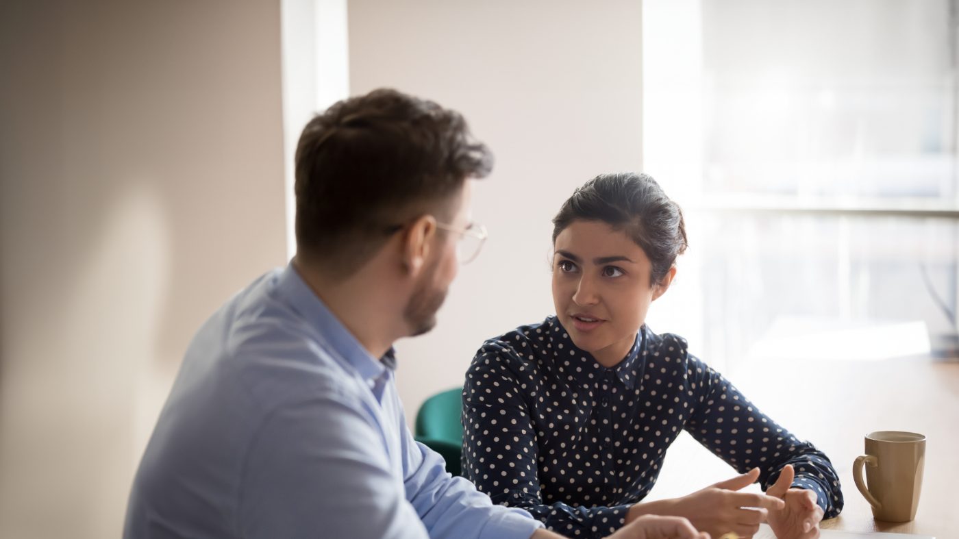 Two people talking with each other