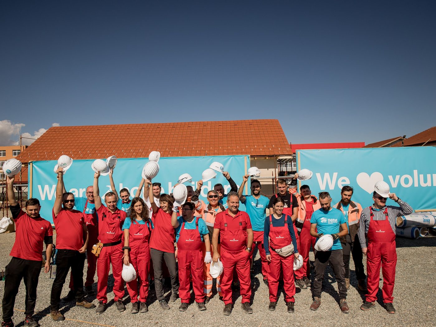 Habitat for Humanity - people building houses