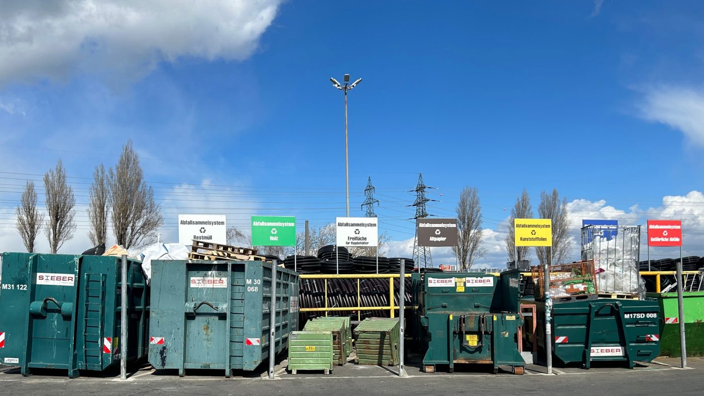 Waste management, containers, blue sky